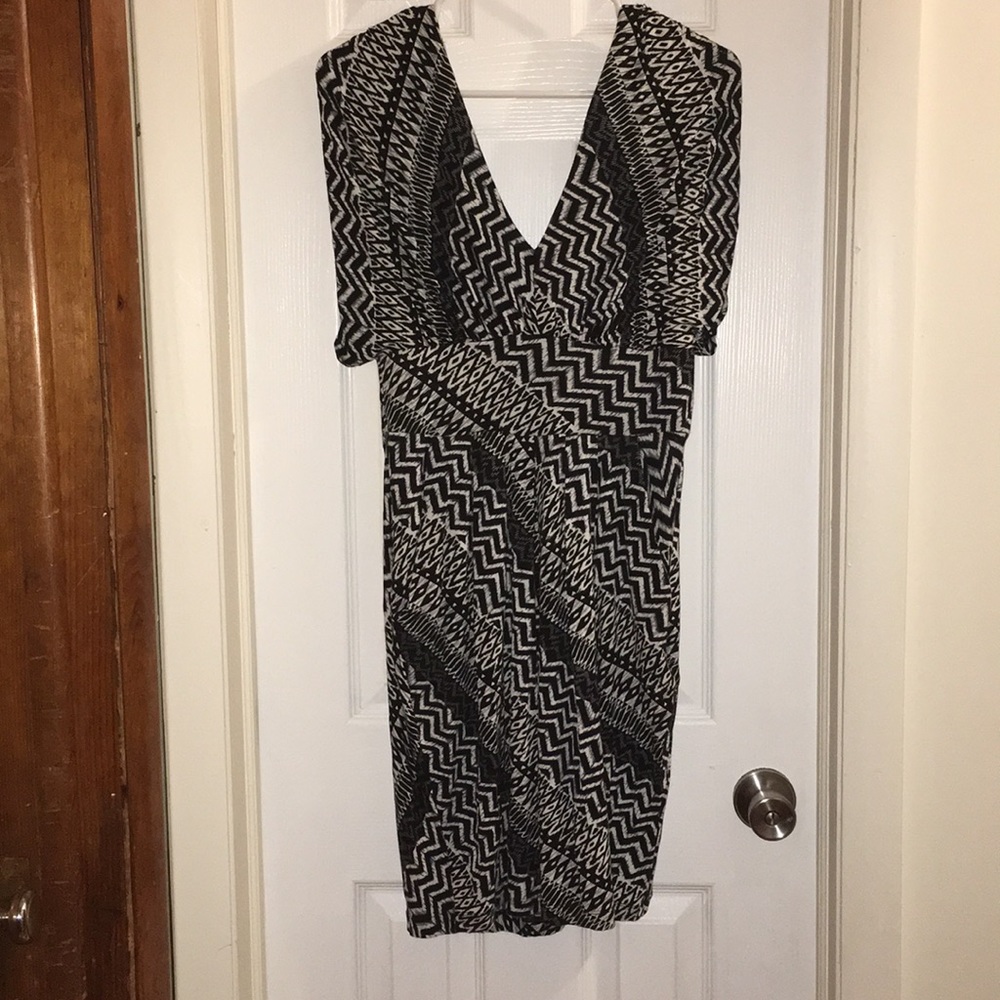 Knee length, form-fitting dress